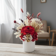 Sympathy arrangement close-up in home setting