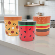Three empty food-themed pots on kitchen bench - no plants